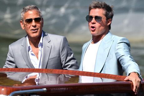 George Clooney com Brad Pitt no Festival de Veneza