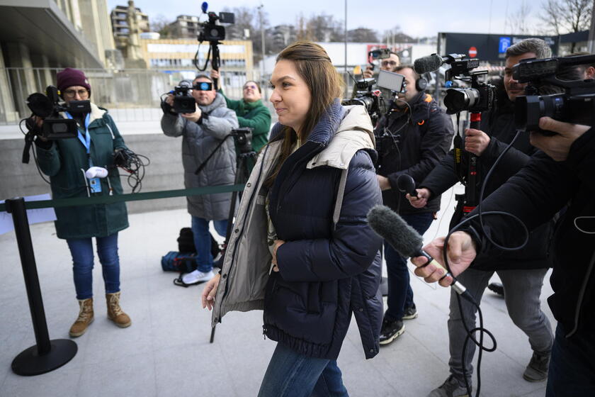 Former WTA number 1 tennis player Simona Halep arrives for arbitration hearing