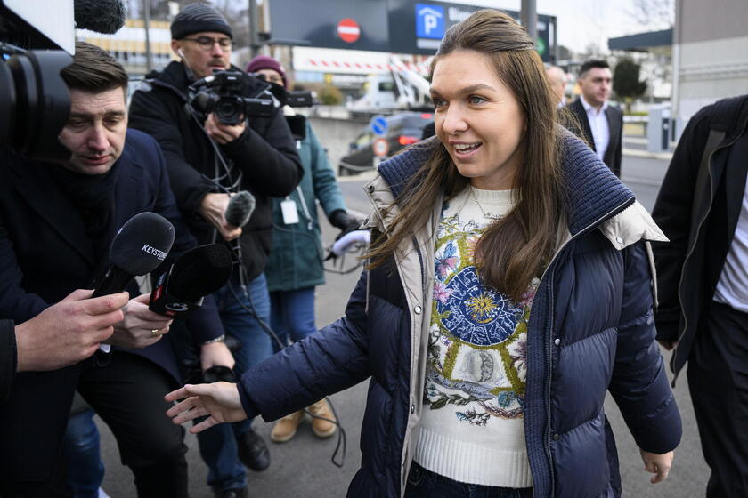 Former WTA number 1 tennis player Simona Halep arrives for arbitration hearing