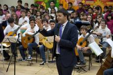 RENZI GETS DOWN TO 'SERIOUS' BUSINESS AT TREVISO SCHOOL