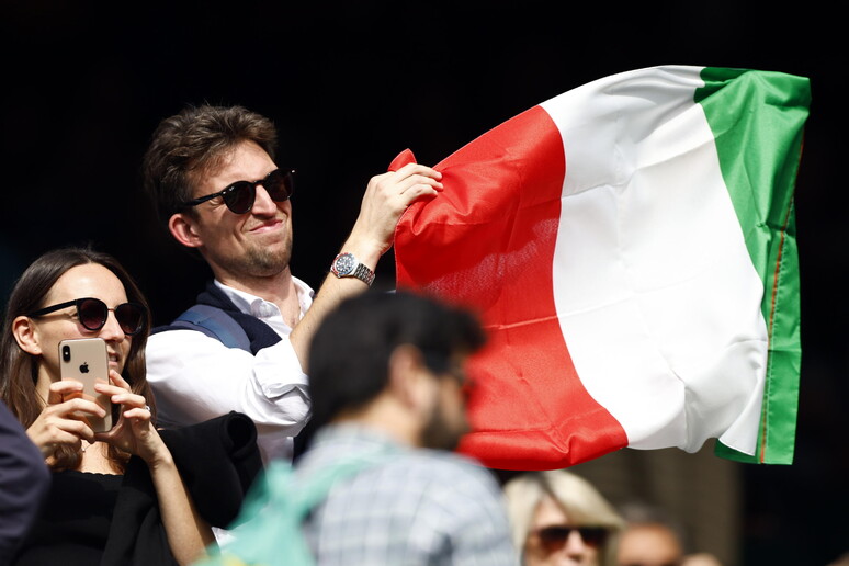 Bandeira italiana durante partida de tênis © ANSA/EPA