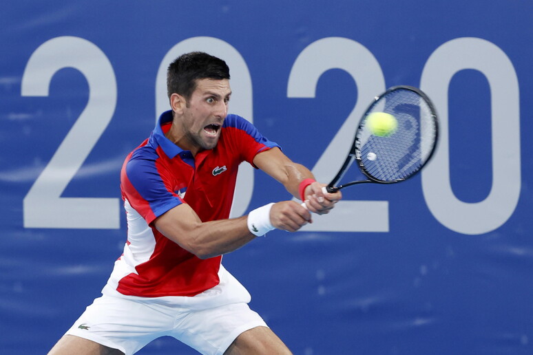 Tennis Novak Djokovic of Serbia in action against Jan-Lennard Struff of Germany during the Men 's Sin - RIPRODUZIONE RISERVATA