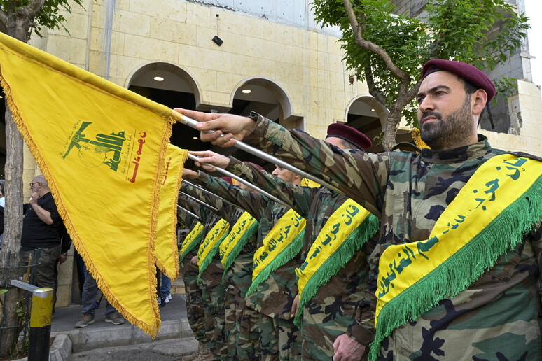 Miliziani di Hezbollah © ANSA/EPA